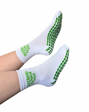 Load image into Gallery viewer, "RESTING GRINCH FACE" (MID CREW) GRIP SOCKS

