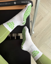 Load image into Gallery viewer, "RESTING GRINCH FACE" (MID CREW) GRIP SOCKS
